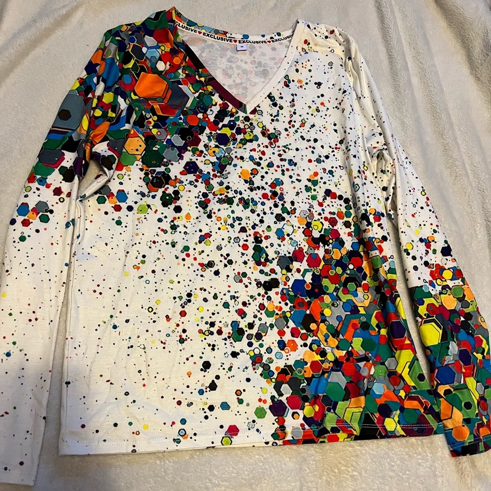 Long sleeve multi color pattern shirt Xclusive exclusive is the brand